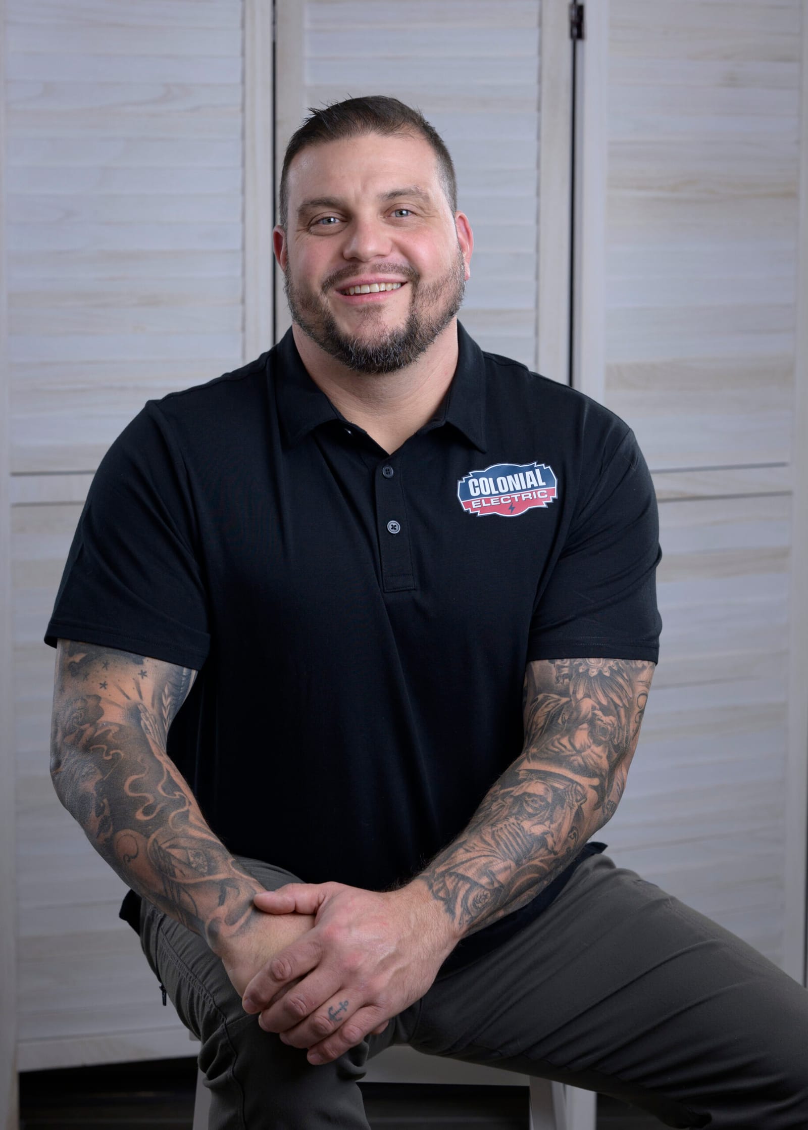Scott Hays, founder of Colonial Electric, in a Colonial Electric polo